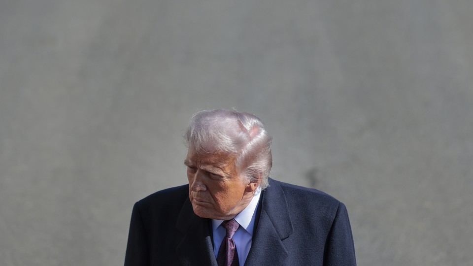 Portrait of Trump wearing a suit, angled from slightly above