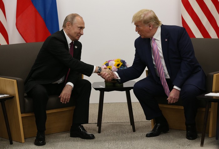 Donald Trump and Vladimir Putin attend their bilateral meeting at the G20 Osaka Summit 2019 in Osaka Japan