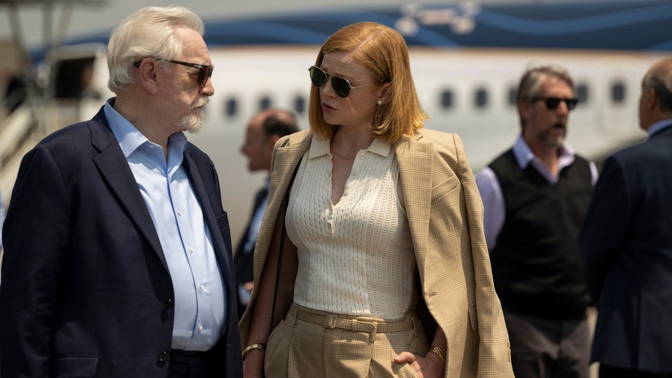 Brian Cox and Sarah Snook near a private jet on 'Succession'