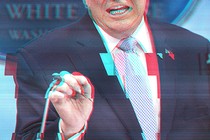Photo of Donald Trump from the nose down speaking at a podium, with the image tinted red and blue as if glitching