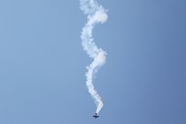 A plane performs a spiral.
