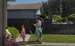 A family in a suburban neighborhood