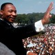 MLK waves at crowd