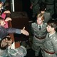 East German border policemen refusing to shake hands with a Berliner over the border fence in November, 1989