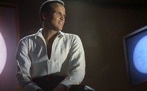 Performer Harry Belafonte poses on a television-studio set.
