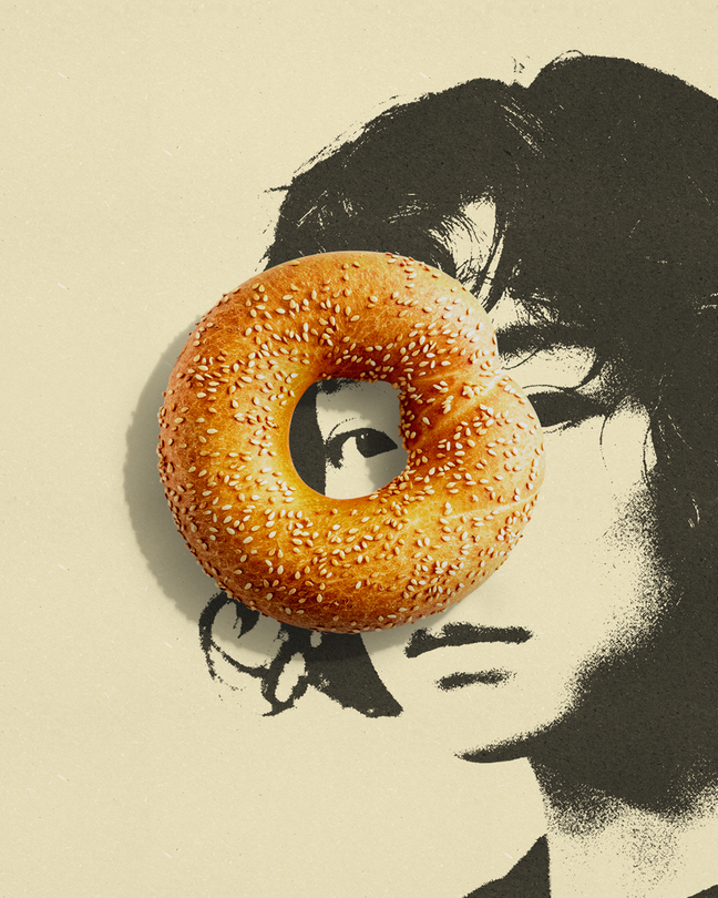 A black-and-white sketch of an Asian woman against a cream background. There is a sesame bagel centered over her left eye.