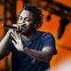 kendrick lamar performing on stage