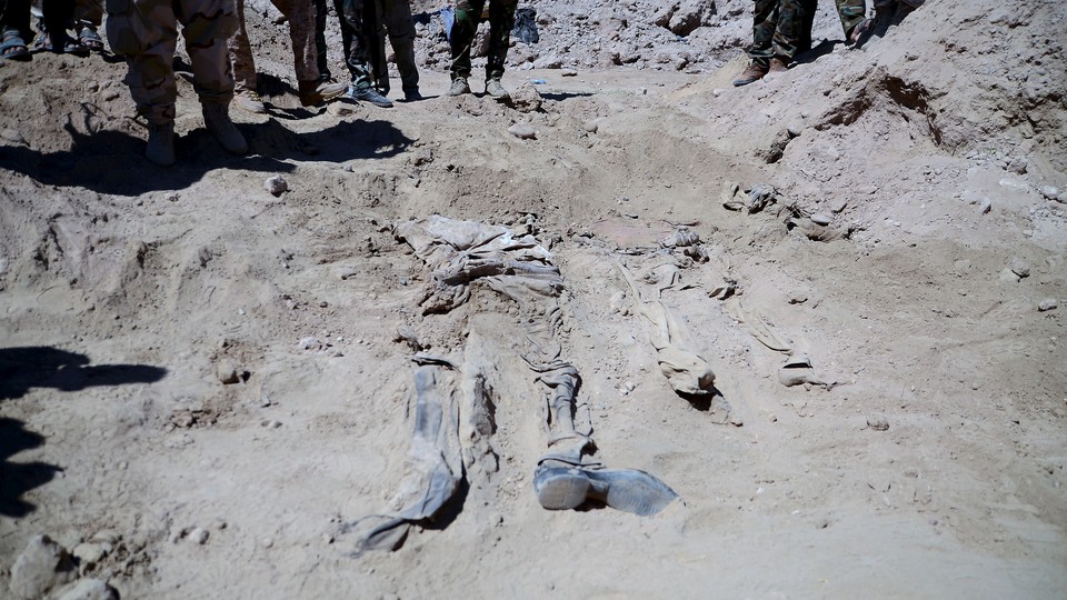 Remnants of bodies of Shiite soldiers who have been killed by Islamic State militants are seen at a mass grave in Tikrit, Iraq.