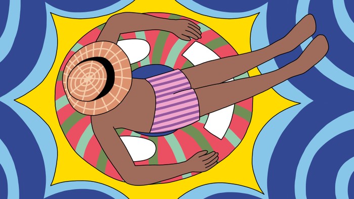 A man chills on a pool floaty