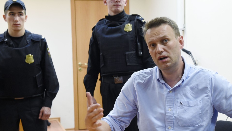 Russian opposition leader Alexei Navalny speaks after a hearing in a court in Moscow, late on June 12, 2017.