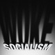 Illustration showing "SOCIALISM" sign, but the shadow of the letters reads "WOKE"