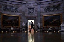 A person walks through the Capitol building