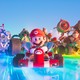Mario and his friends race on go-karts in 'The Super Mario Bros. Movie'