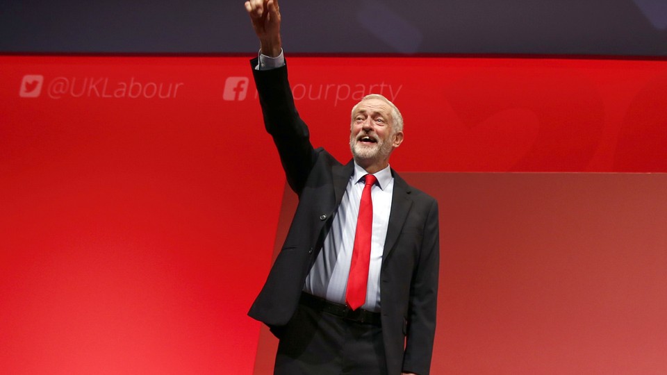 Labour Party leader Jeremy Corbyn reacts after the announcement of his victory in the party's leadership election.