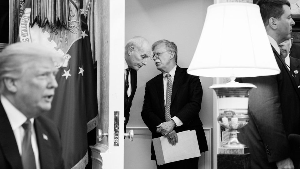 Former White House Chief of Staff John Kelly talks to ex–National Security Adviser John Bolton in a doorway of the White House. President Donald Trump is seen speaking off to the side.
