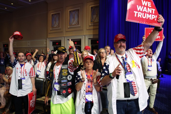 Supporters celebrate as they listen to Donald Trumps address to the annual Conservative Political Action Conference