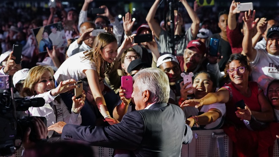 Amlo with smiling supporters