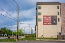 A photograph showing a building advertising apartments for lease on March 19, 2024, in Austin, Texas