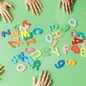 Photo of letters, kids' hands