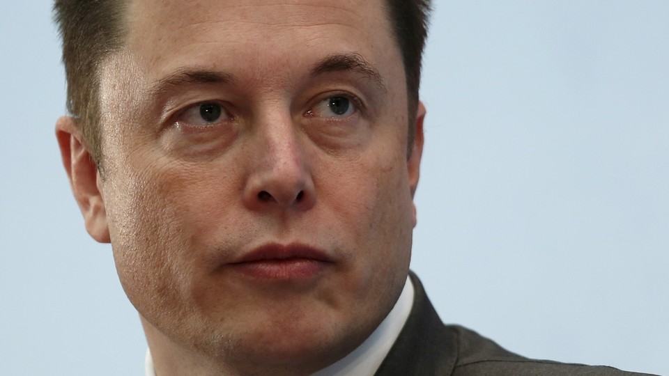 A close up of Elon Musk's face