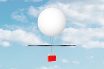 Illustration of a balloon carrying a shopping bag through the sky