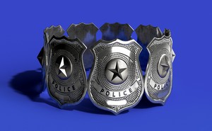 A circle of silver police badges standing against a blue background