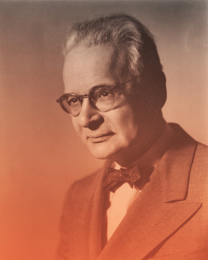 photo of man in glasses and bow tie