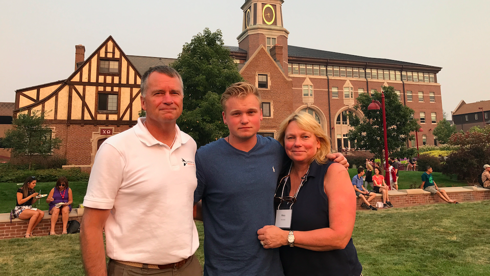 From left to right: James, Jonathan, and Mary Winnefeld at the University of Denver campus