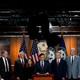 Photograph of Republican representatives and Speaker Mike Johnson at a news conference at the Capitol.