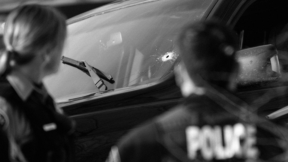 Minneapolis Shooting car window