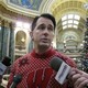 Wisconsin Governor Scott Walker speaks to reporters.