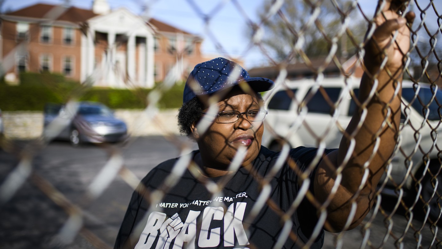 Sheila Clemmons Lee stands in the parking lot of the James A. Cayce Homes in East Nashville where Officer Joshua Lippert of the Metro Nashville Police Department shot and killed her son, Jocques Clemmons.