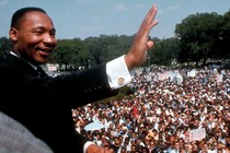 MLK waves at crowd