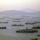 An aerial view of cargo ships in Hong Kong harbor.