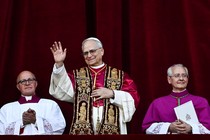 Pope Leo XIV, flanked by two other high-ranking Catholic leaders
