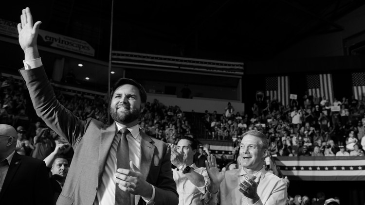J. D. Vance waving