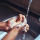 Man washing his hands