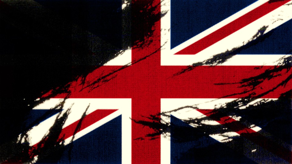 A British Union Jack flag smeared with black paint
