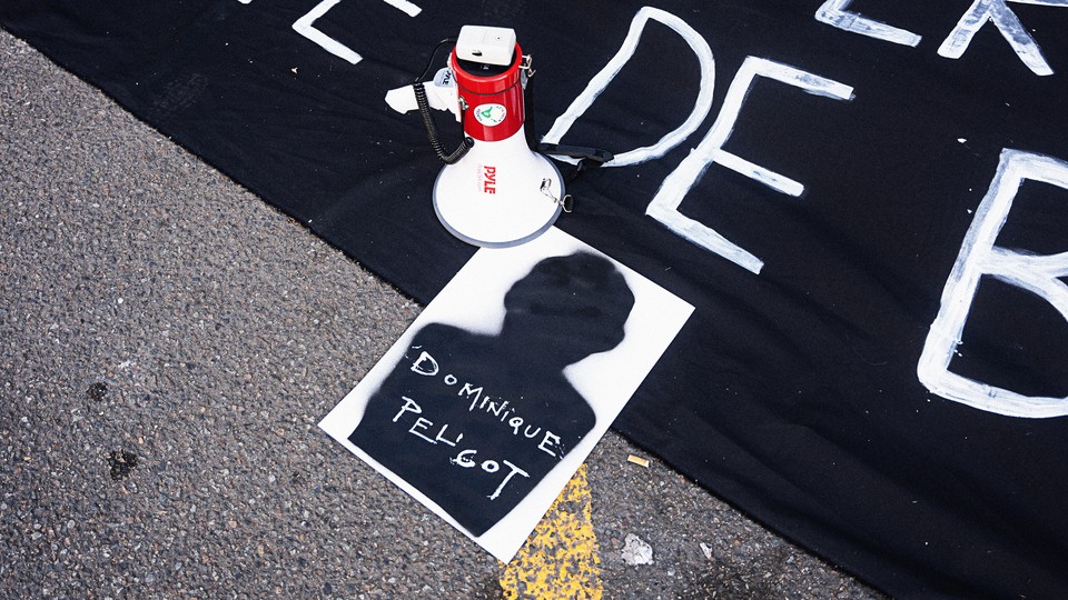 A bullhorn on a protest sign