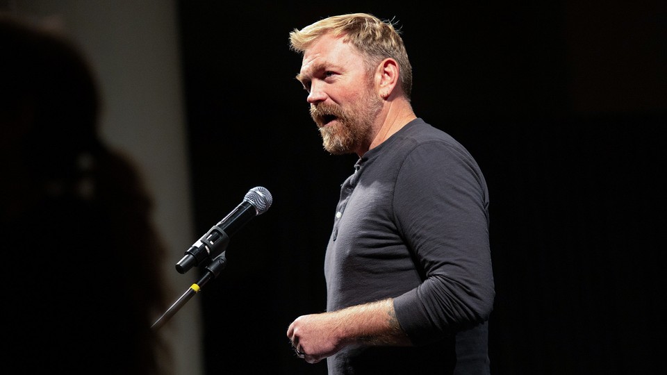 Photo of Graham Platner speaking at a microphone