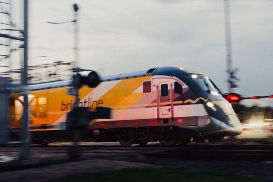 Picture of a Brightline train heading north in West Palm Beach, Florida