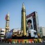 A display with missiles and a portrait of Ayatollah Ali Khamanei