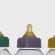 A close-up image of three baby bottles.