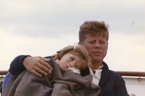 President John F. Kennedy sits on a yacht with his daughter Caroline off Hyannis Port, Massachusetts, in August 1963.