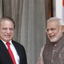 India Prime Minister Narendra Modi (R) and his Pakistani counterpart Nawaz Sharif smile before the start of their bilateral meeting in New Delhi May 27, 2014.