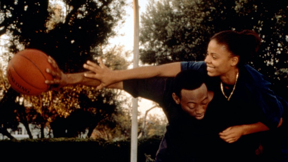 A still from the movie Love & Basketball with two characters playing one-on-one