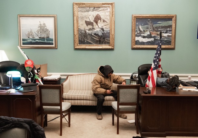 Insurrectionists put their feet up in Pelosi's office