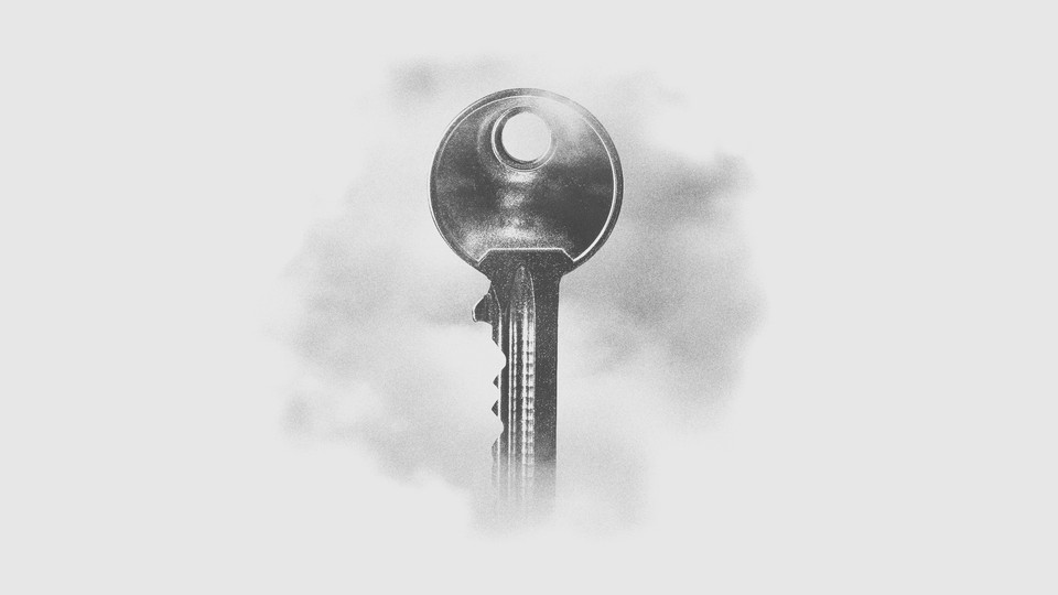 A grey key floats in the white and grey fog