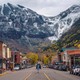 A street in Telluride with mountains in the background