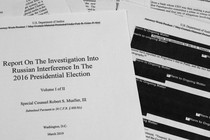 A photo of the redacted version of the Mueller report